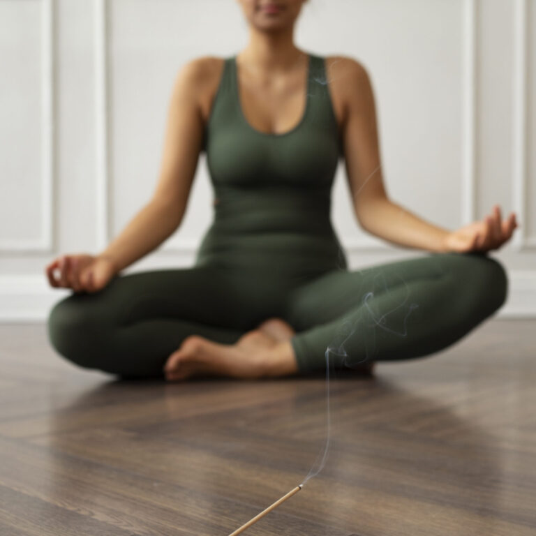 young-woman-with-yoga-essentials